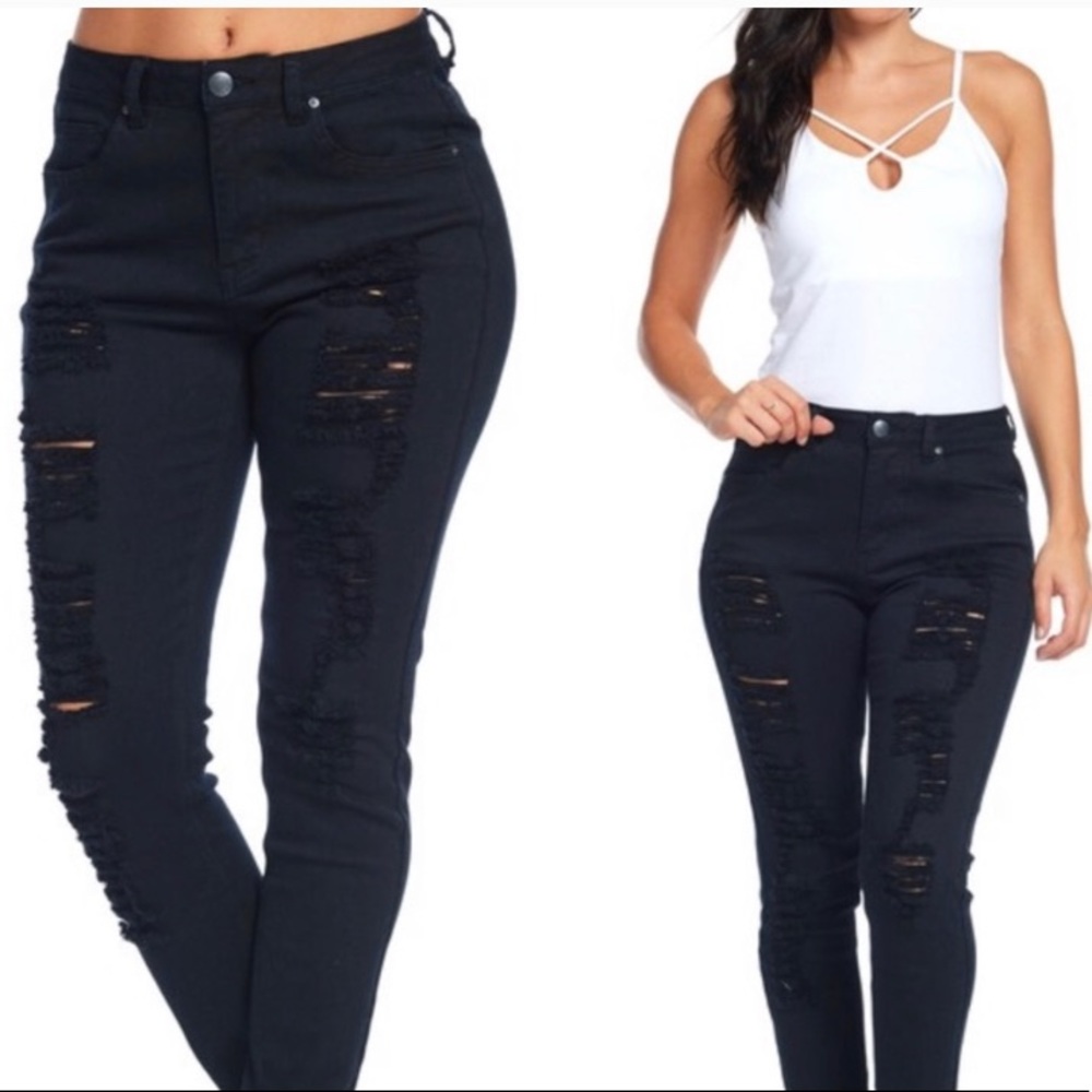 Super distressed mid rise skinny jean